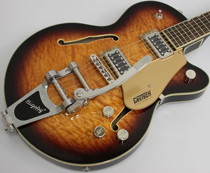 Электрогитара Gretsch G2655T-P90 Streamliner Center Block Double Cutaway with Bigsby 2021 - Present - Two Tone Sahara Metallic/Vintage Mahogany Stain
Электрогитара Gretsch G2655T-P90 Streamliner Center Block Double Cutaway with Bigsby 2021 - Present - Two Tone Sahara Metallic/Vintage Mahogany Stain