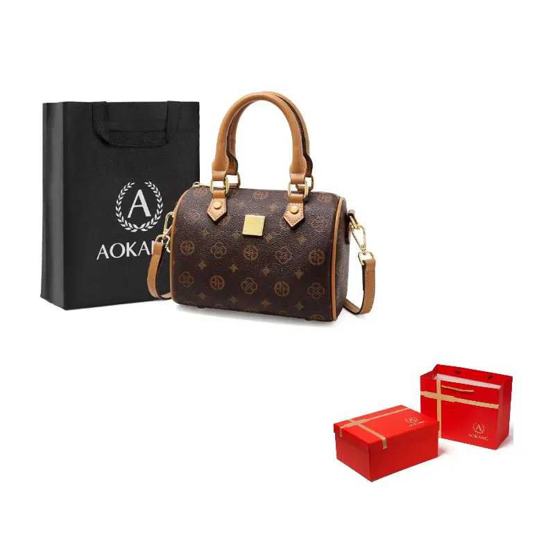 AOKANG Мамина сумка из ПВХ Бостонская сумка Наплечная сумка Через плечо Женская сумка Средний размер Кожаный шарм Кофе Экрю, Coffee color - 3326
AOKANG Мамина сумка из ПВХ Бостонская сумка Наплечная сумка Через плечо Женская сумка Средний размер Кожаный шарм Кофе Экрю, Coffee color - 3326