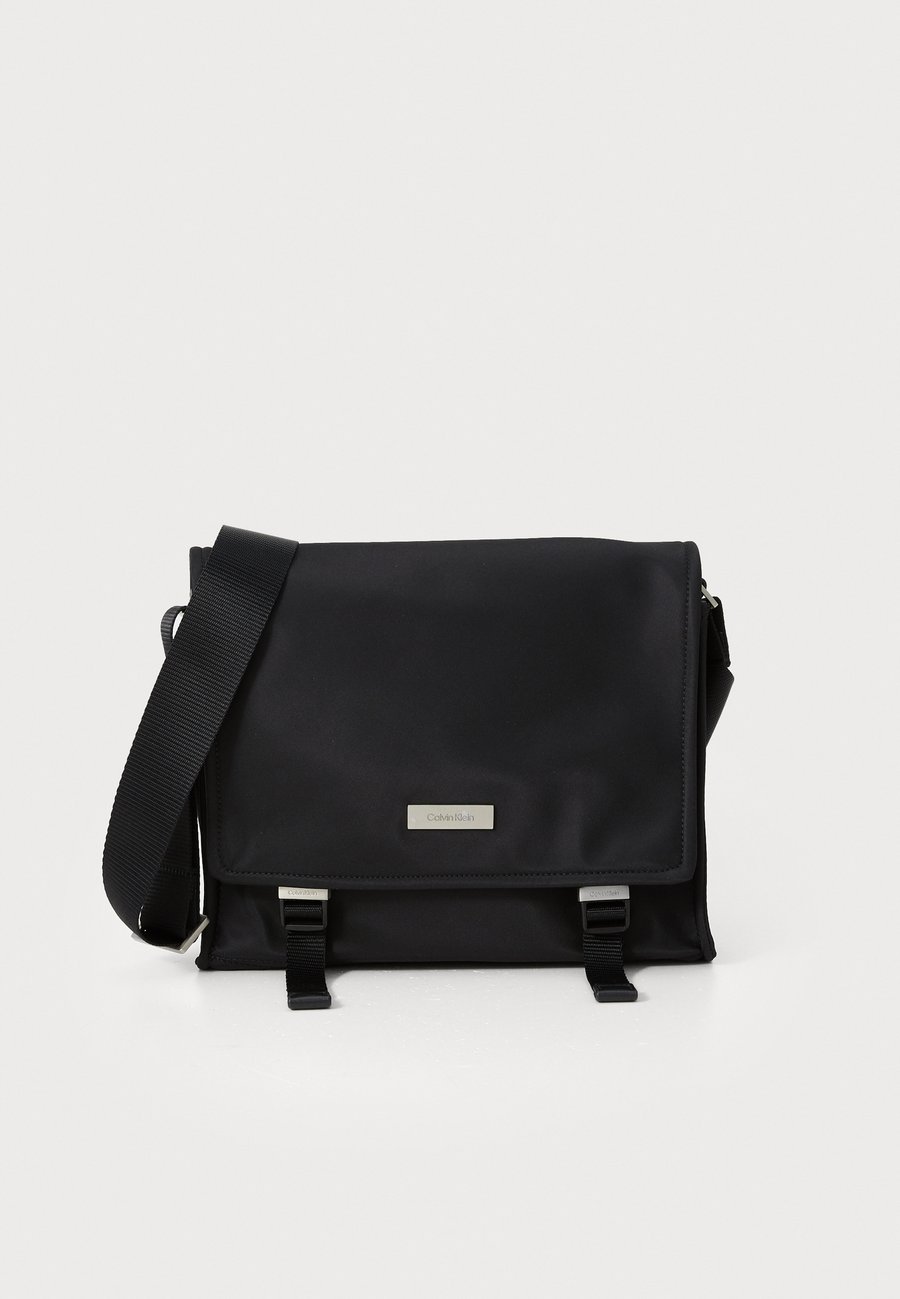 Сумка кросс-боди Calvin Klein MICRO PEBBLE, Black
Сумка кросс-боди Calvin Klein MICRO PEBBLE, Black