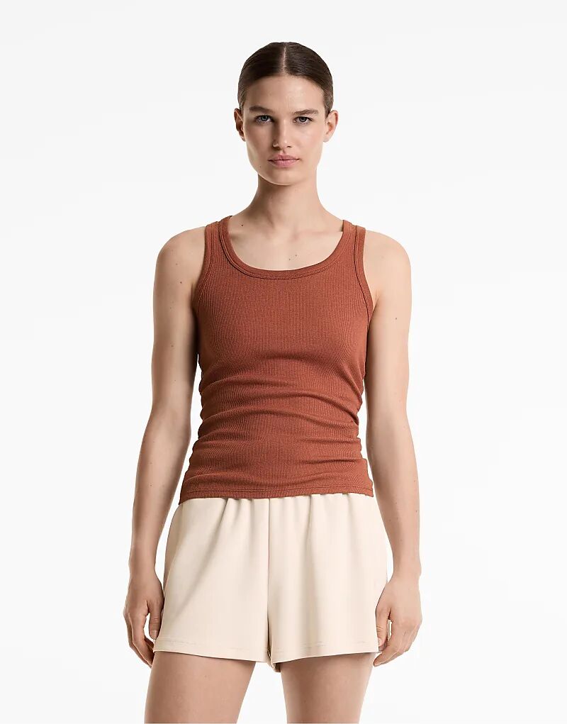 Топ без рукавов Oysho в рубчик из хлопка и модала коричневого плиточно-красного цвета
Топ без рукавов Oysho в рубчик из хлопка и модала коричневого плиточно-красного цвета