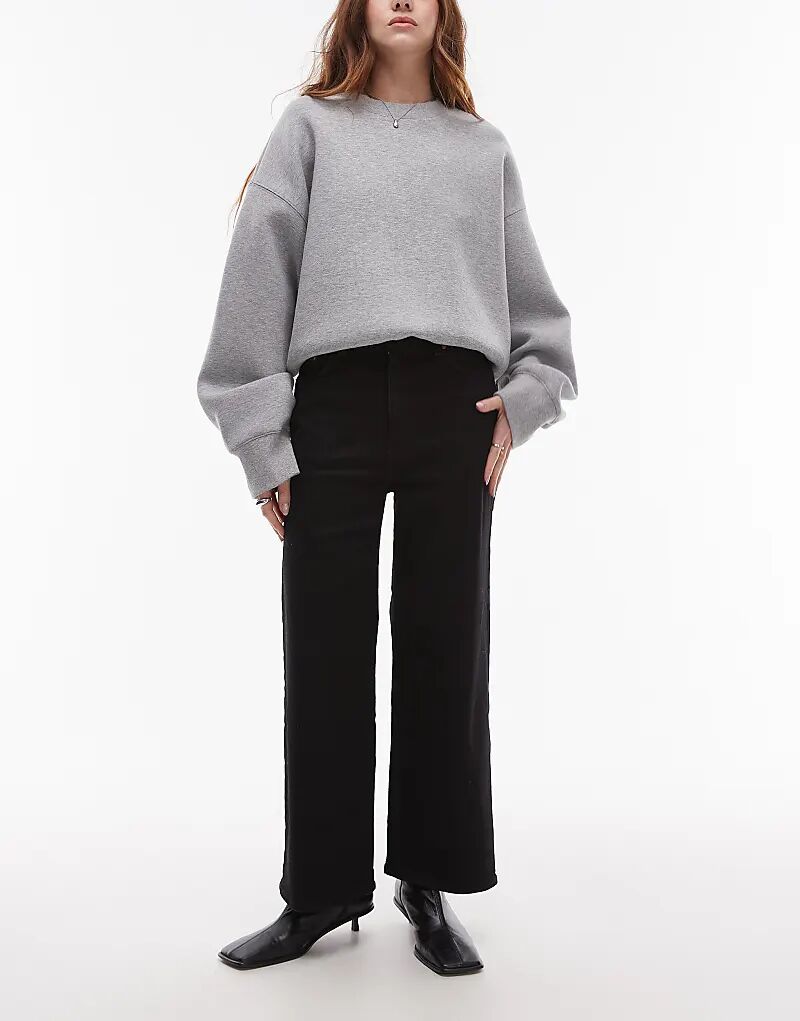 Укороченные джинсы стретч с широкими штанинами черного цвета & Other Stories
Укороченные джинсы стретч с широкими штанинами черного цвета & Other Stories