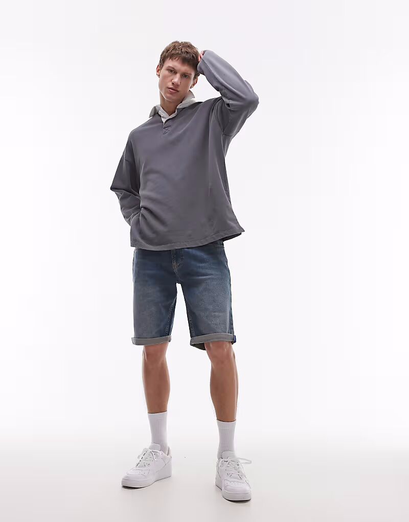 Джинсовые шорты Tommy Jeans Ronnie темного цвета
Джинсовые шорты Tommy Jeans Ronnie темного цвета