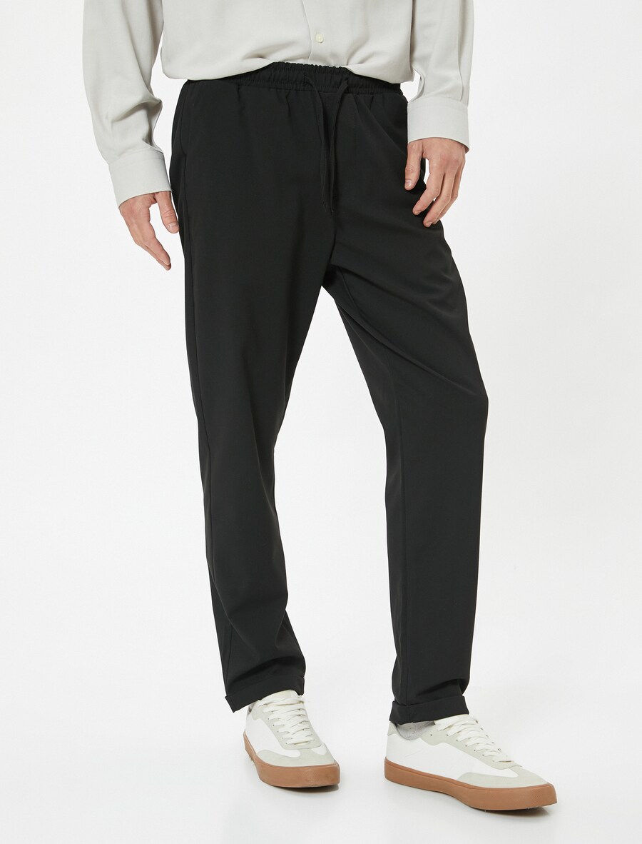 Брюки зауженного кроя Koton, черный
Брюки зауженного кроя Koton, черный
