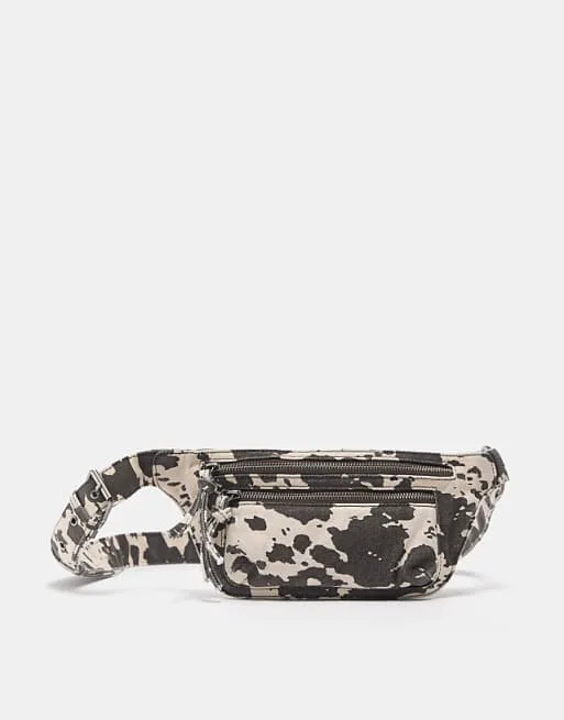 Коричневая поясная сумка с коровьим принтом Pull&Bear
Коричневая поясная сумка с коровьим принтом Pull&Bear