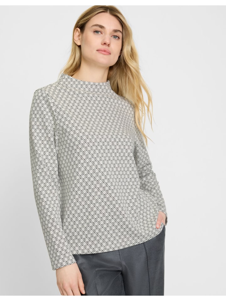 Белый свитер Olsen
Белый свитер Olsen