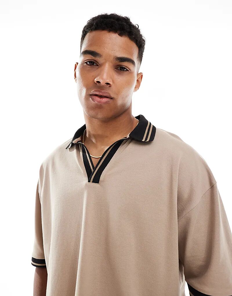 Поло свободного кроя ASOS DESIGN с контрастным воротником и отделкой подола из пике цвета камня
Поло свободного кроя ASOS DESIGN с контрастным воротником и отделкой подола из пике цвета камня