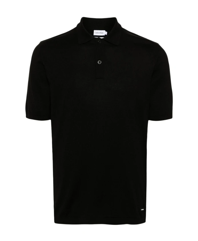 Трикотажная рубашка-поло с нашивкой-логотипом. Calvin Klein, черный
Трикотажная рубашка-поло с нашивкой-логотипом. Calvin Klein, черный