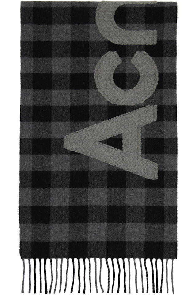 Acne Studios Шарф в черно-серую клетку с логотипом
Acne Studios Шарф в черно-серую клетку с логотипом