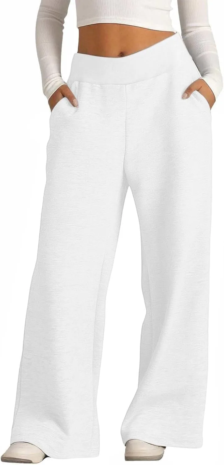 Женские широкие спортивные штаны с высокой талией и карманами
Женские широкие спортивные штаны с высокой талией и карманами