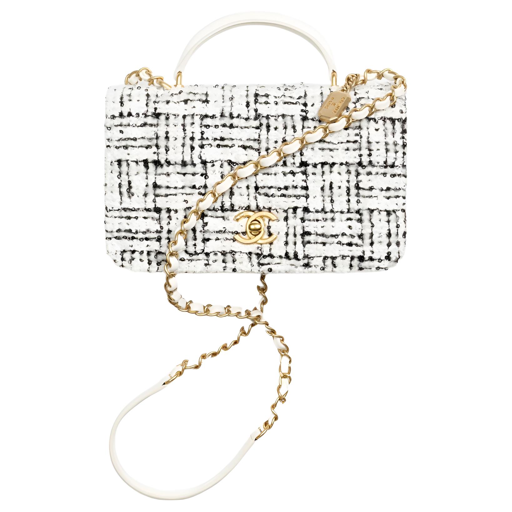 CHANEL Твидовая кожаная сумка через плечо миниатюрная женская бело-черная
CHANEL Твидовая кожаная сумка через плечо миниатюрная женская бело-черная