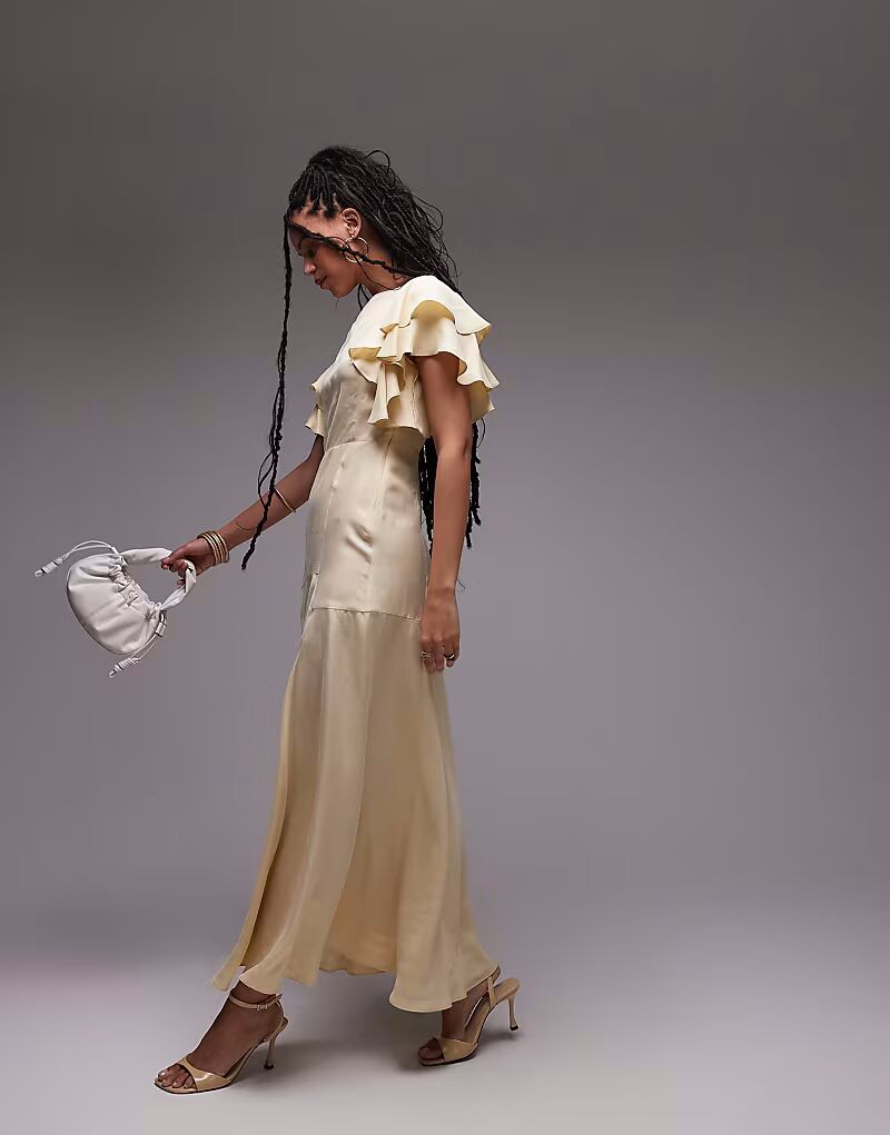 & Other Stories макси-платье с рукавами-оборками и открытой спиной светло-желтого цвета
& Other Stories макси-платье с рукавами-оборками и открытой спиной светло-желтого цвета