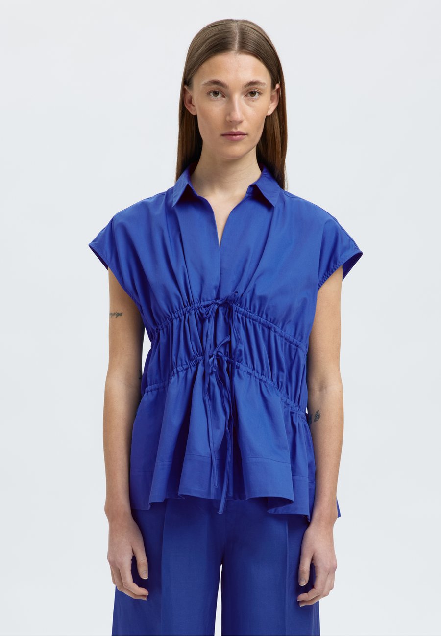 Блуза Selected Femme SLFALLY SL TIE , Dazzling Blue/Blue
Блуза Selected Femme SLFALLY SL TIE , Dazzling Blue/Blue