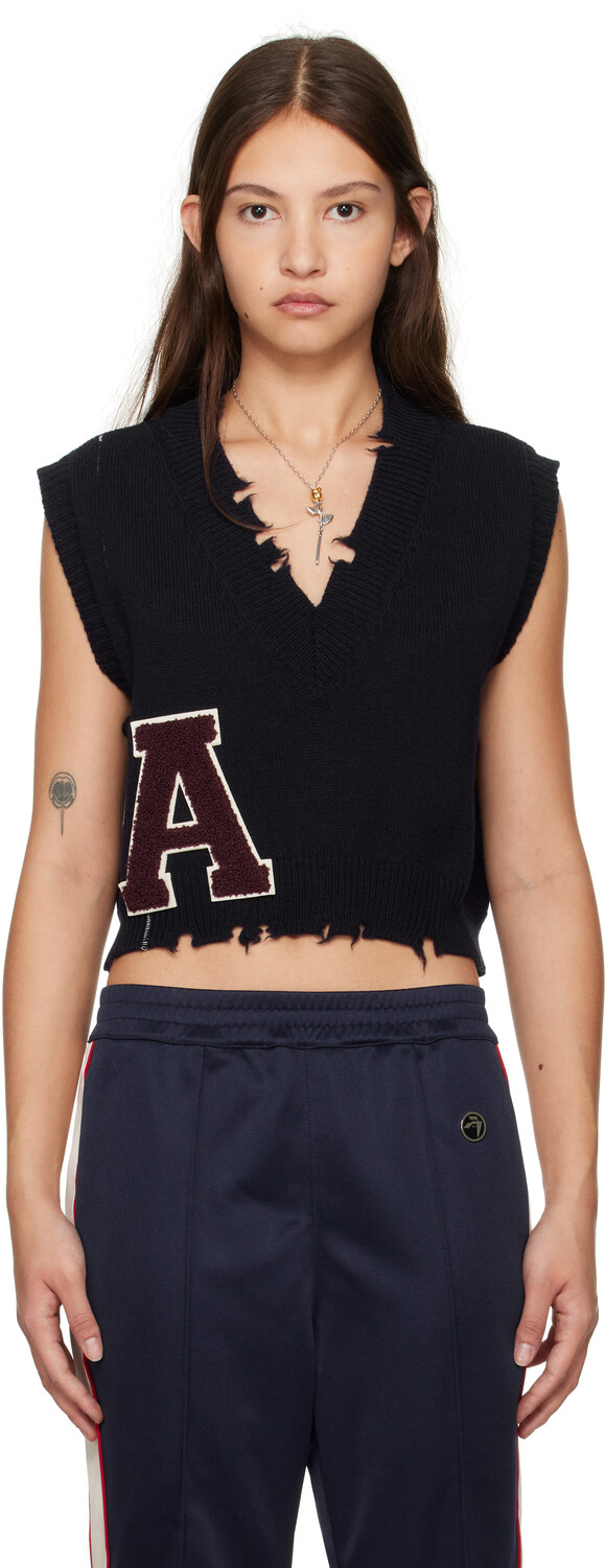 Жилет темно-синего цвета с V-образным вырезом и рваной резинкой AMBUSH
Жилет темно-синего цвета с V-образным вырезом и рваной резинкой AMBUSH