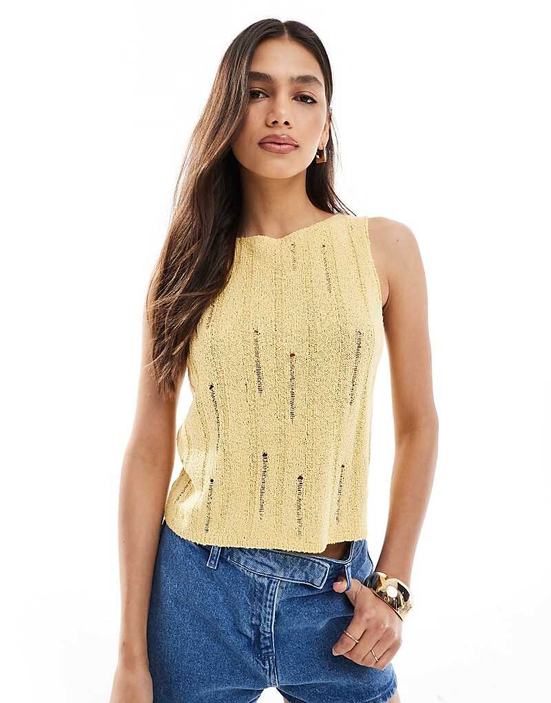 ASOS DESIGN – Вязаная майка желтого цвета из пряжи Boucl >9 с эффектом сметочного стежка
ASOS DESIGN – Вязаная майка желтого цвета из пряжи Boucl >9 с эффектом сметочного стежка