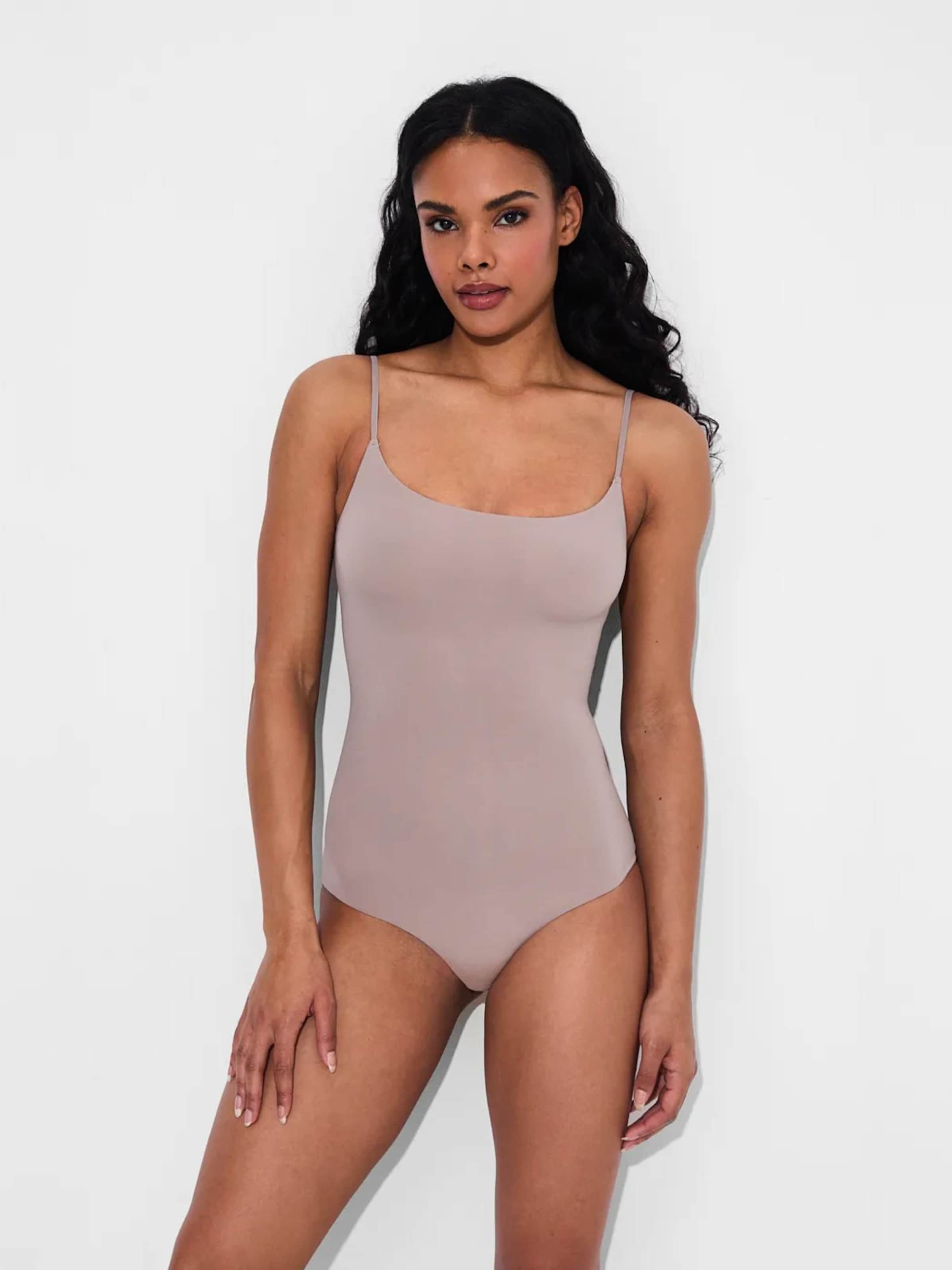 Creamy Корректирующий боди 'Cami Bodysuit mit String' в Rose Gold
Creamy Корректирующий боди 'Cami Bodysuit mit String' в Rose Gold