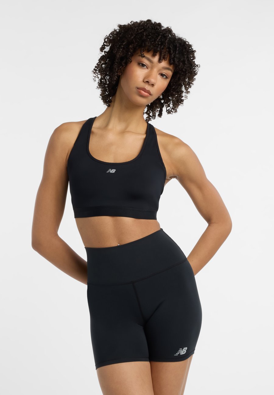 Бюстгальтер New Balance NB ESSENTIAL RUN, Black
Бюстгальтер New Balance NB ESSENTIAL RUN, Black