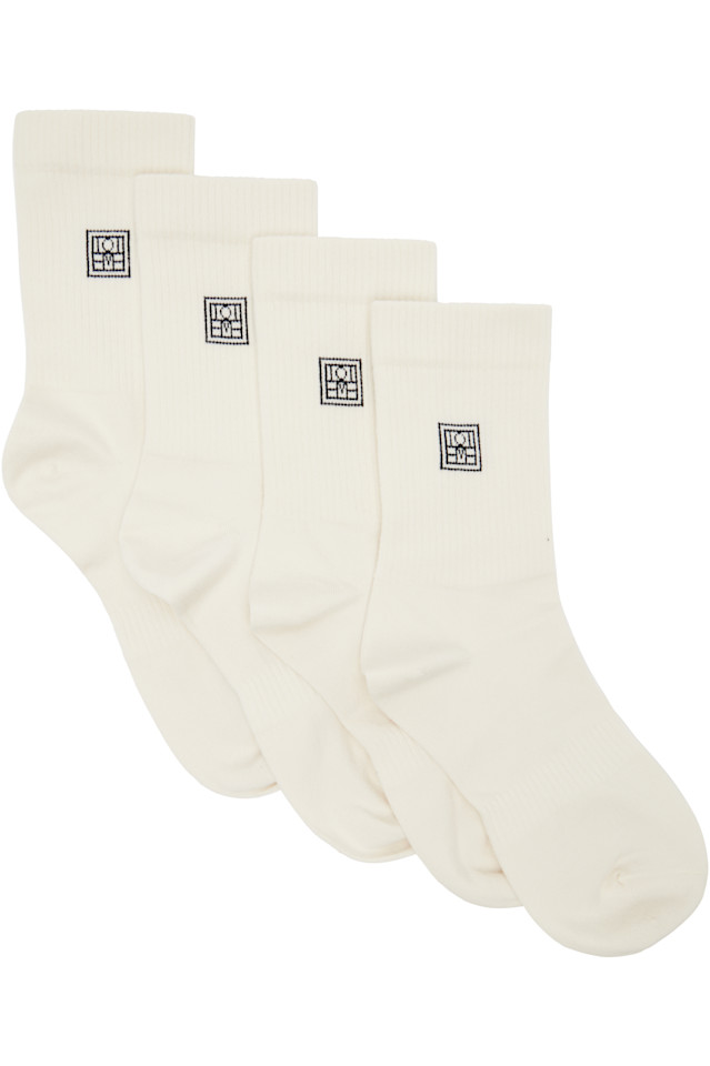 Toteme Комплект из двух пар носков кремового цвета с монограммой
Toteme Комплект из двух пар носков кремового цвета с монограммой