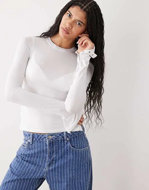 Приталенный топ Weekday с длинными рукавами, пуговицами и асимметричным подолом кремового цвета, Бежевый, Приталенный топ Weekday с длинными рукавами, пуговицами и асимметричным подолом кремового цвета
Приталенный топ Weekday с длинными рукавами, пуговицами и асимметричным подолом кремового цвета, Бежевый, Приталенный топ Weekday с длинными рукавами, пуговицами и асимметричным подолом кремового цвета