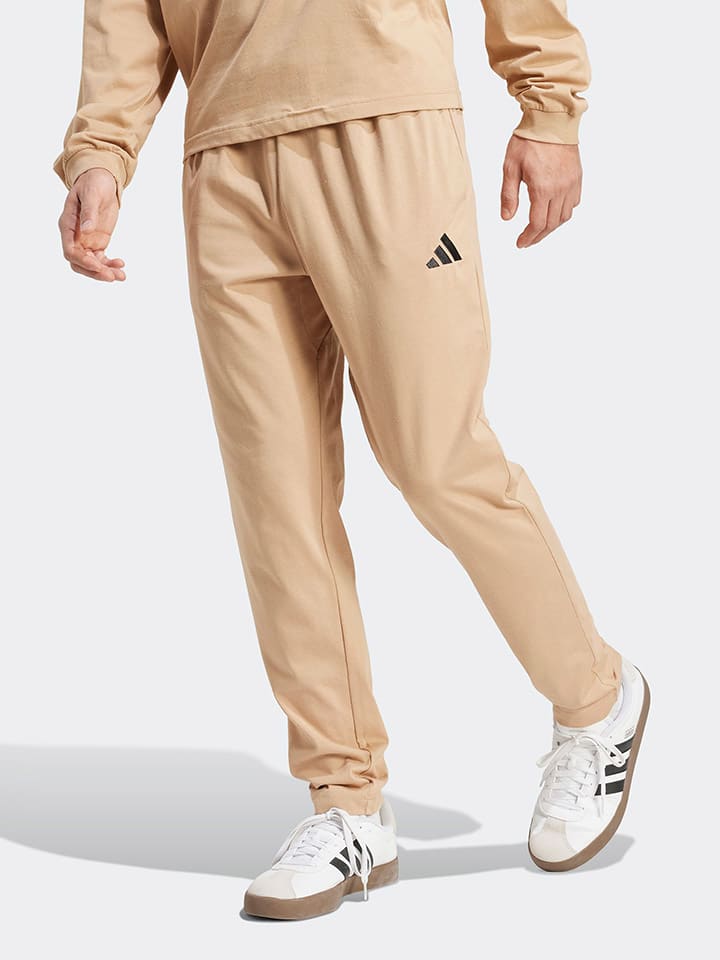 Adidas Бежевые спортивные штаны
Adidas Бежевые спортивные штаны