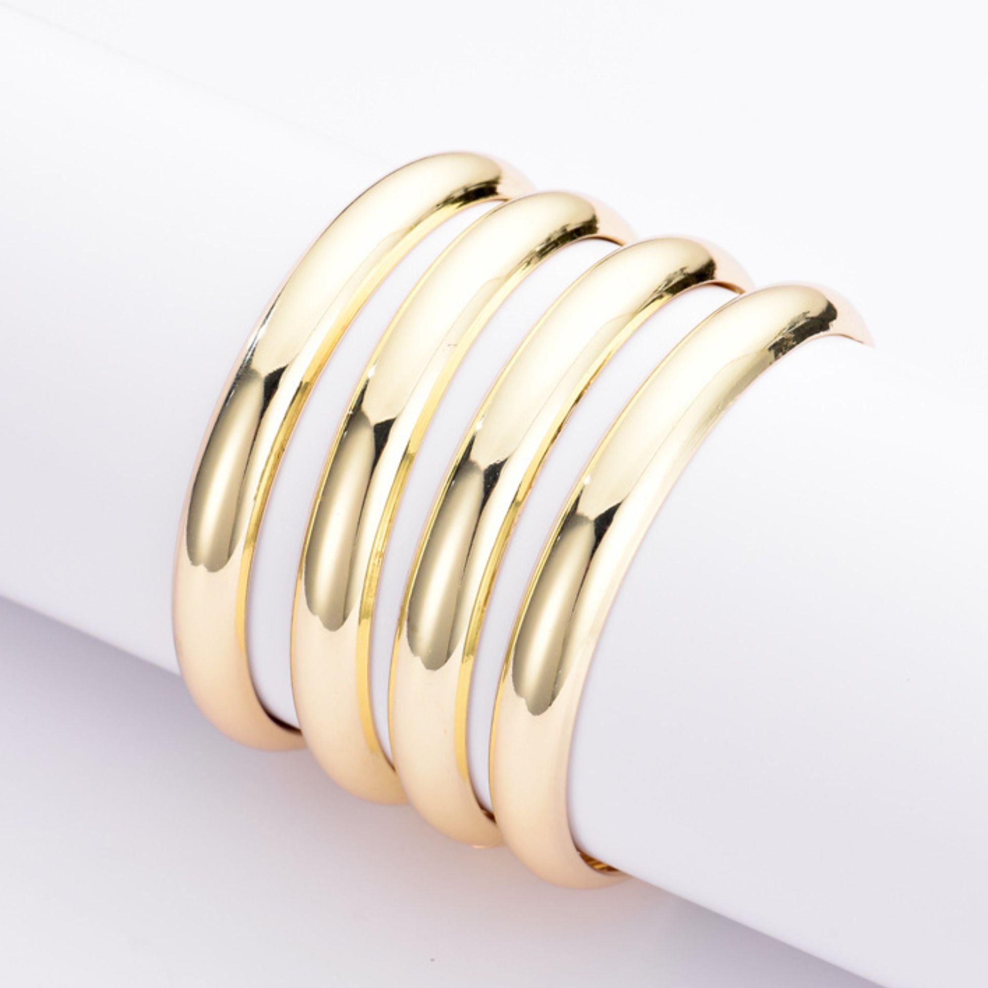 Комплект из 4 позолоченных браслетов Adornia, золотой
Комплект из 4 позолоченных браслетов Adornia, золотой