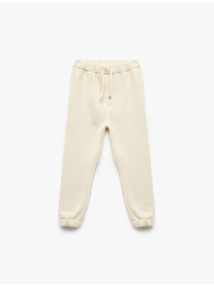 Спортивные брюки бежевого цвета KOTON
Спортивные брюки бежевого цвета KOTON