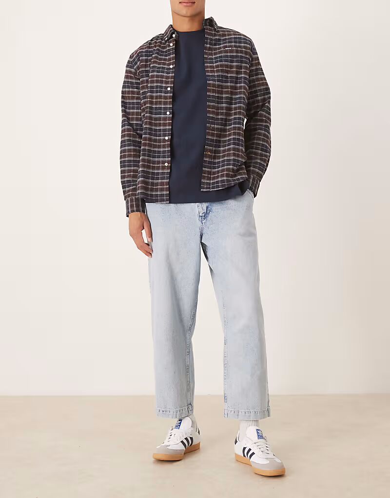 Свободные зауженные джинсы со складками из выбеленного денима Asos Design
Свободные зауженные джинсы со складками из выбеленного денима Asos Design