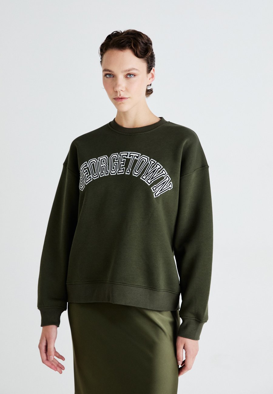 Толстовка Gina Tricot Sweatshirt, Forest Night/Green, Зеленый, Толстовка Gina Tricot Sweatshirt, Forest Night/Green
Толстовка Gina Tricot Sweatshirt, Forest Night/Green, Зеленый, Толстовка Gina Tricot Sweatshirt, Forest Night/Green