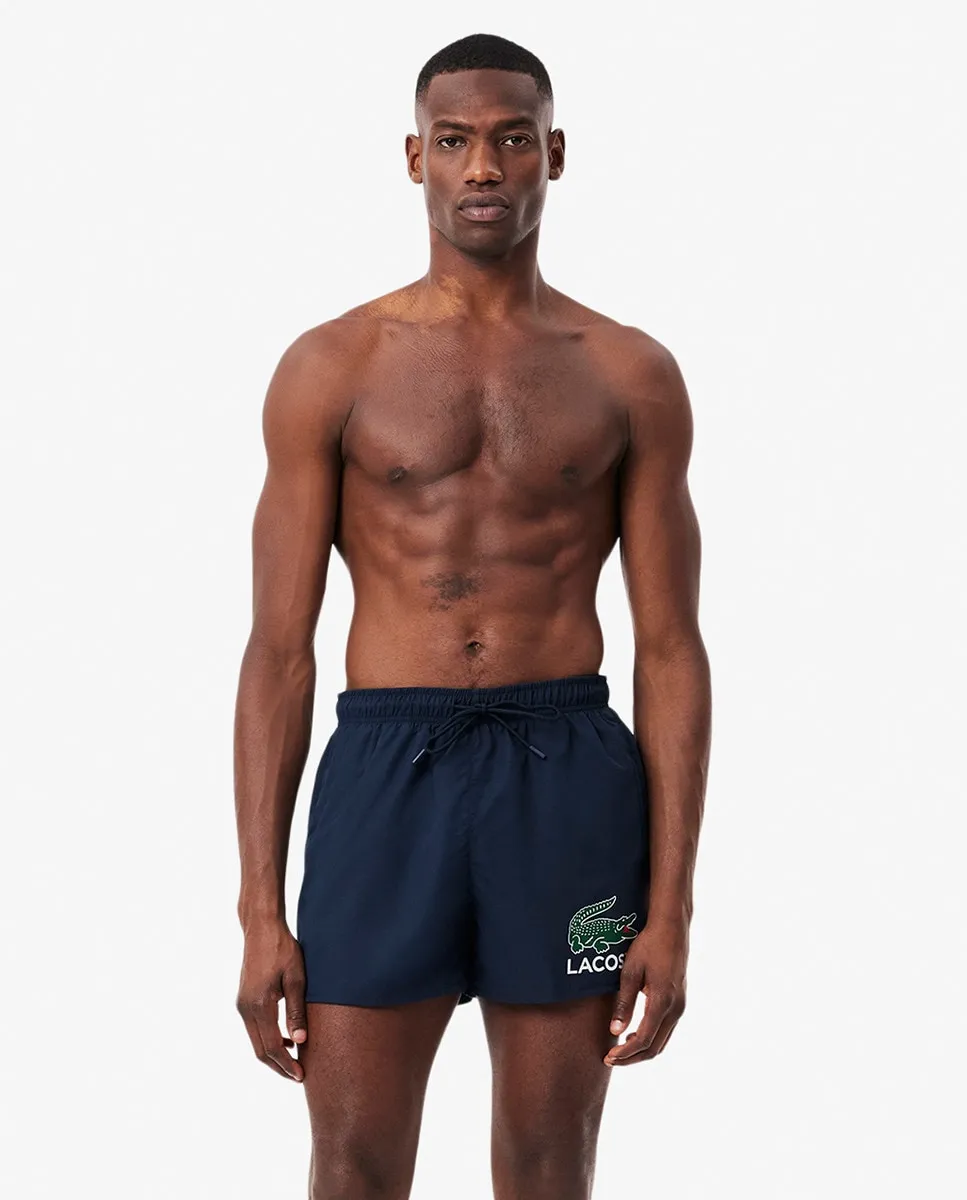 Мужской купальник с двумя боковыми карманами и одним задним карманом Lacoste, тёмно-синий
Мужской купальник с двумя боковыми карманами и одним задним карманом Lacoste, тёмно-синий