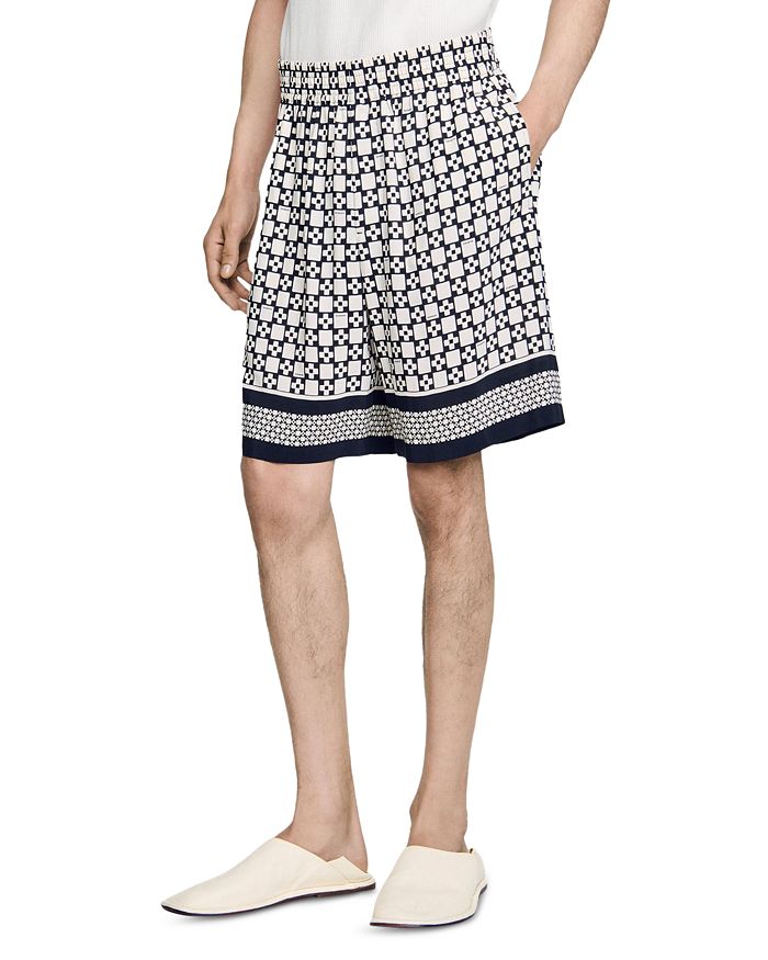 Плавные бермуды Sandro, черный
Плавные бермуды Sandro, черный