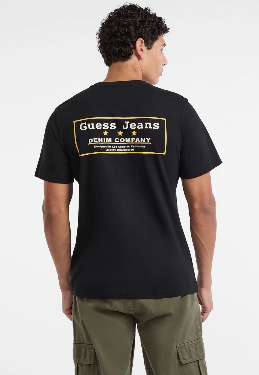 Футболка Guess Jeans MIT RÜCKSEITIGEM, Schwarz/Black
Футболка Guess Jeans MIT RÜCKSEITIGEM, Schwarz/Black