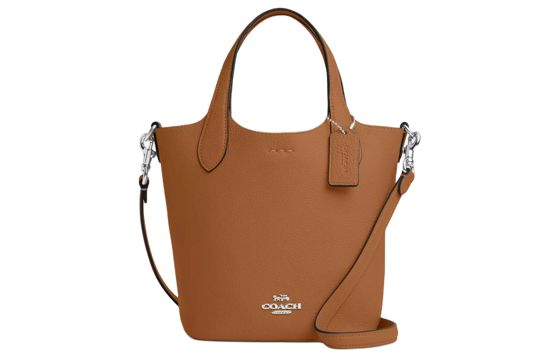 Сумка-ведро Hanna из кожи с двусторонним дизайном, через плечо, на одно плечо, серебристый и светло-седловидный COACH
Сумка-ведро Hanna из кожи с двусторонним дизайном, через плечо, на одно плечо, серебристый и светло-седловидный COACH