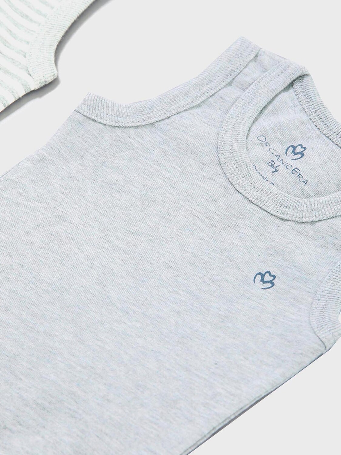 OrganicEra Комбинезон/боди 'Organic Baby Sleeveless Bodysuit, 2 pcs Set' в крапчатом сером цвете
OrganicEra Комбинезон/боди 'Organic Baby Sleeveless Bodysuit, 2 pcs Set' в крапчатом сером цвете
