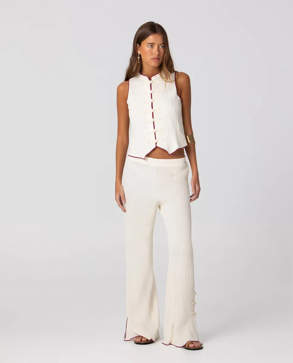 Женские брюки средней посадки с прямым кроем и вышитыми деталями внизу Noon, цвет Crudo
Женские брюки средней посадки с прямым кроем и вышитыми деталями внизу Noon, цвет Crudo