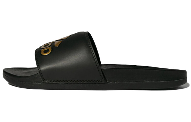 Шлепанцы Adidas Adilette Comfort Slides Core Black Gold Metallic
Шлепанцы Adidas Adilette Comfort Slides Core Black Gold Metallic