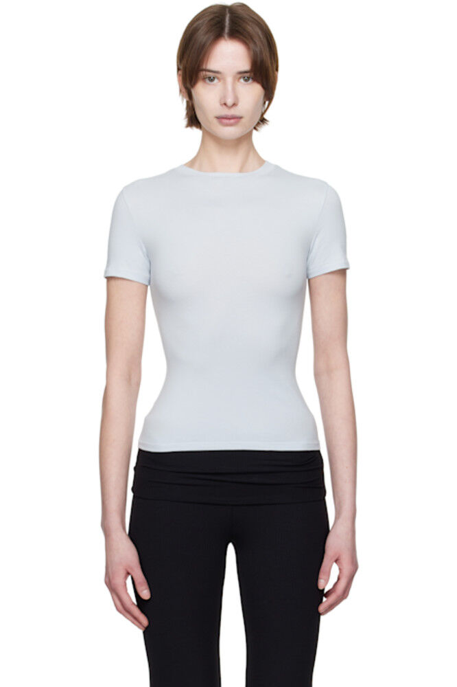 Футболка из хлопкового джерси синего цвета SKIMS
Футболка из хлопкового джерси синего цвета SKIMS