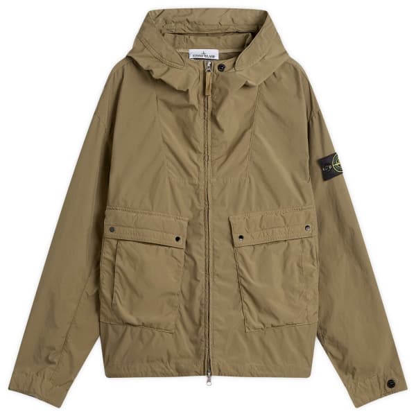 Легкая, компактная куртка с капюшоном из полиэстера с термочувствительным покрытием (поли-ТЦ) Stone Island, military зеленый
Легкая, компактная куртка с капюшоном из полиэстера с термочувствительным покрытием (поли-ТЦ) Stone Island, military зеленый