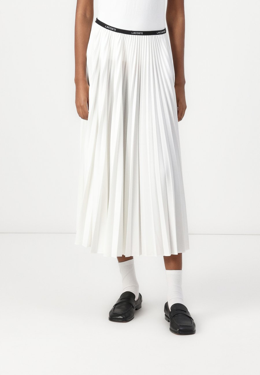 Юбка Lacoste Pleated skirt, Flour/Off-White
Юбка Lacoste Pleated skirt, Flour/Off-White