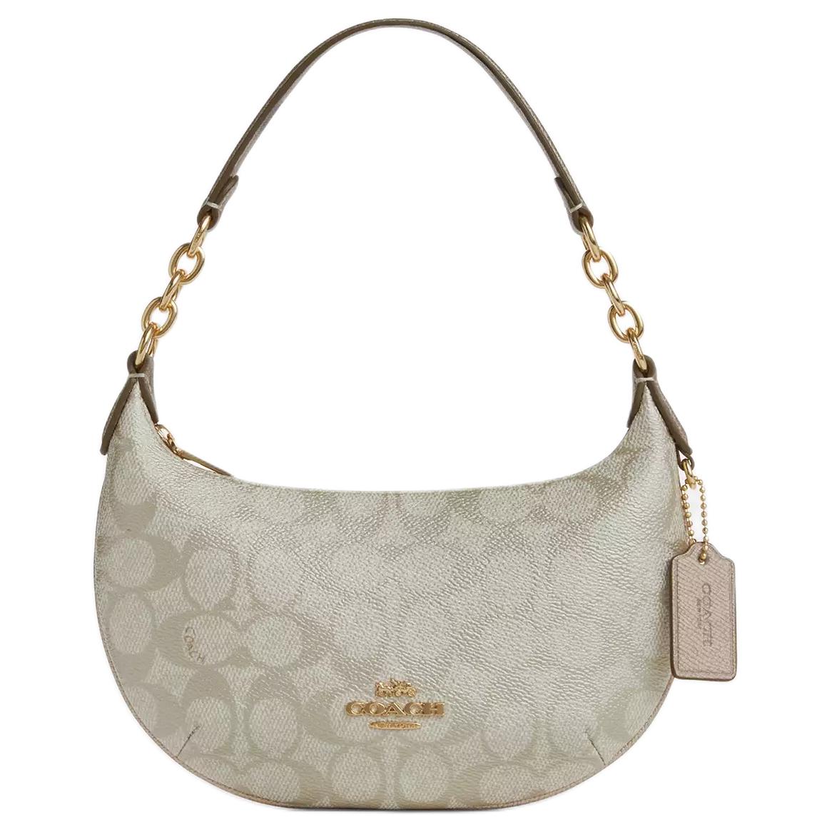 COACH Сумка из лакированного полотна женская шампань 
COACH Сумка из лакированного полотна женская шампань