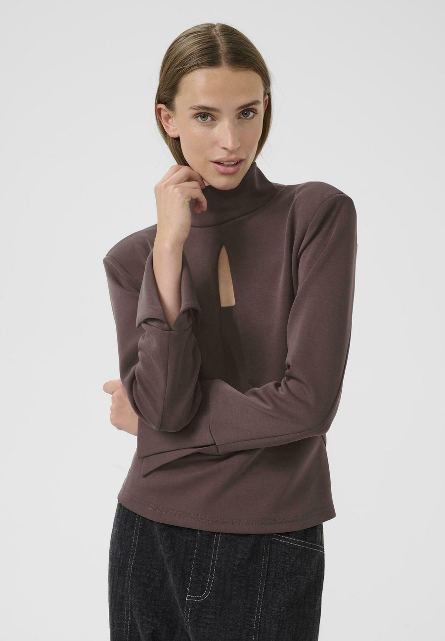 Топ Karen by Simonsen Long sleeved top, Huckleberry/Berry
Топ Karen by Simonsen Long sleeved top, Huckleberry/Berry