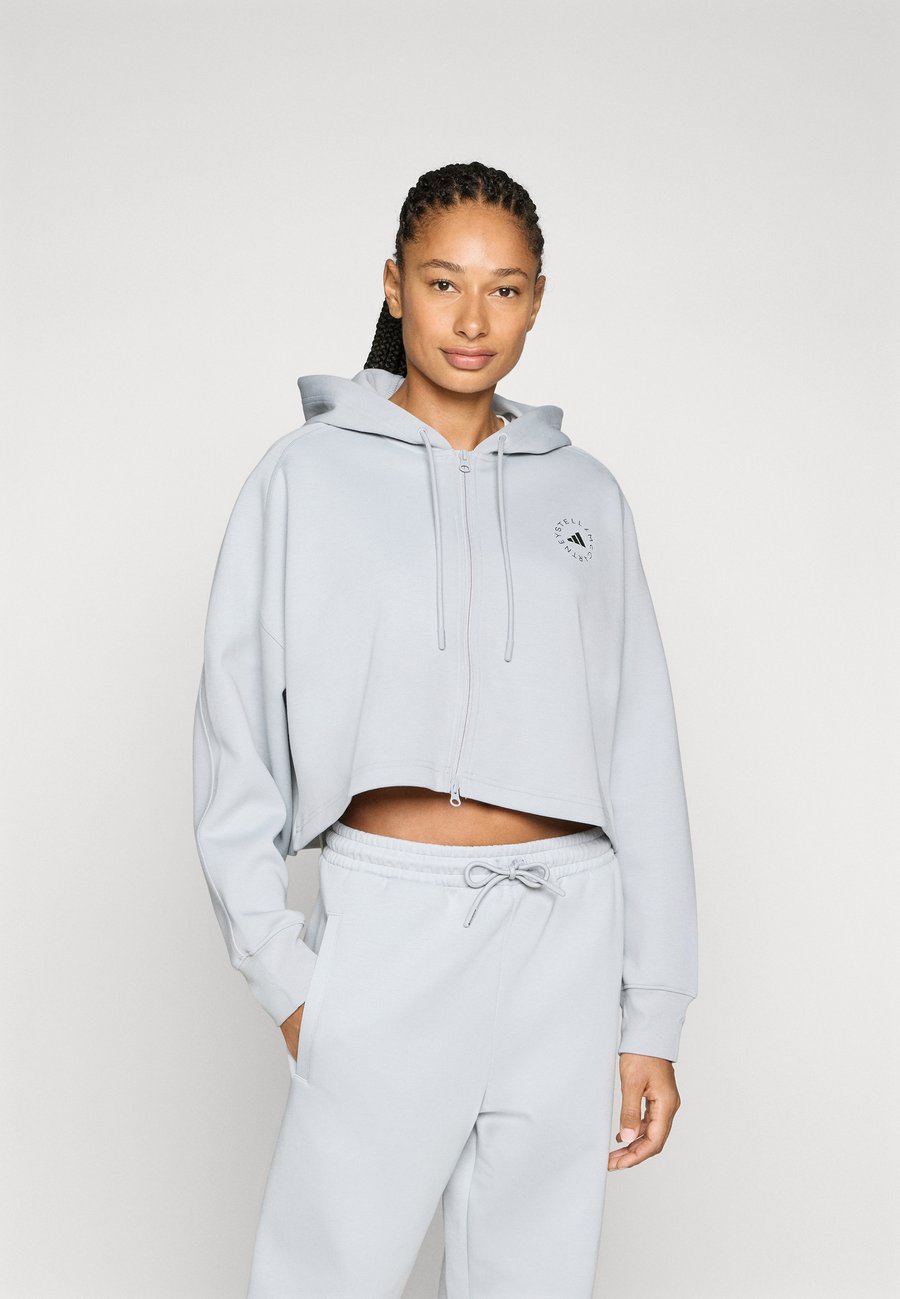 Худи Adidas by Stella McCartney HOODIE, Clear Onix/Light Grey
Худи Adidas by Stella McCartney HOODIE, Clear Onix/Light Grey