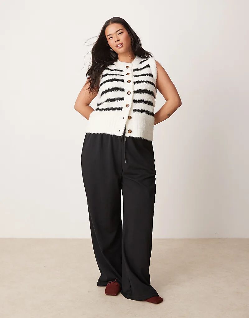 Широкие брюки-джоггеры New Look Curve черного цвета
Широкие брюки-джоггеры New Look Curve черного цвета