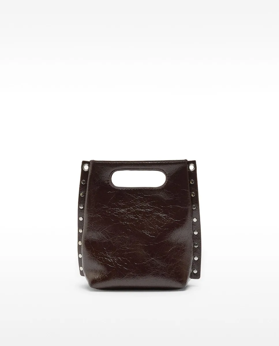 Сумка-тоут с эффектом кракелюра и клепками по краям, трансформирующаяся в сумку через плечо Parfois, темно-коричневый
Сумка-тоут с эффектом кракелюра и клепками по краям, трансформирующаяся в сумку через плечо Parfois, темно-коричневый