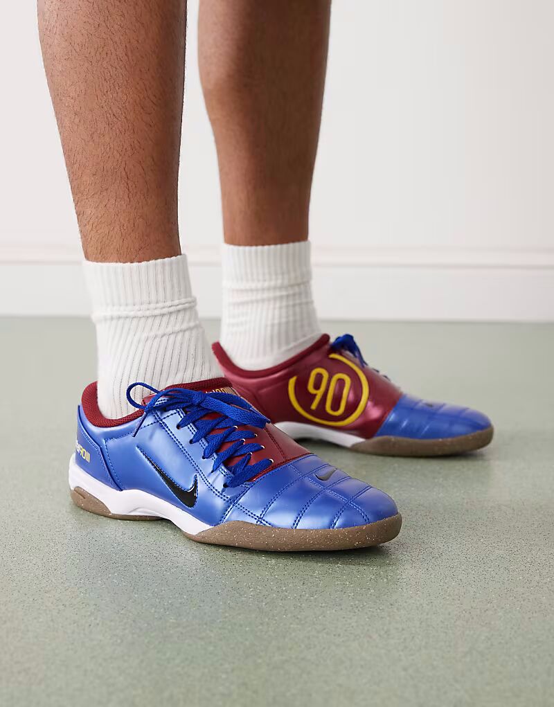 Кроссовки T90 в цвете металлик синего и красного цветов Nike
Кроссовки T90 в цвете металлик синего и красного цветов Nike