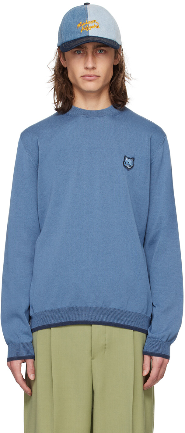 Синий свитер с изображением лисьей головы Maison Kitsune
Синий свитер с изображением лисьей головы Maison Kitsune