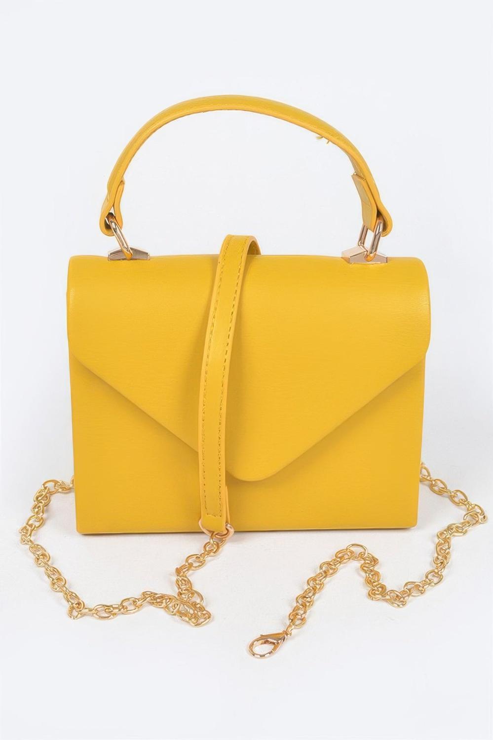 Искусственная кожа Клатч с простой ручкой FASHNZFAB, желтый
Искусственная кожа Клатч с простой ручкой FASHNZFAB, желтый