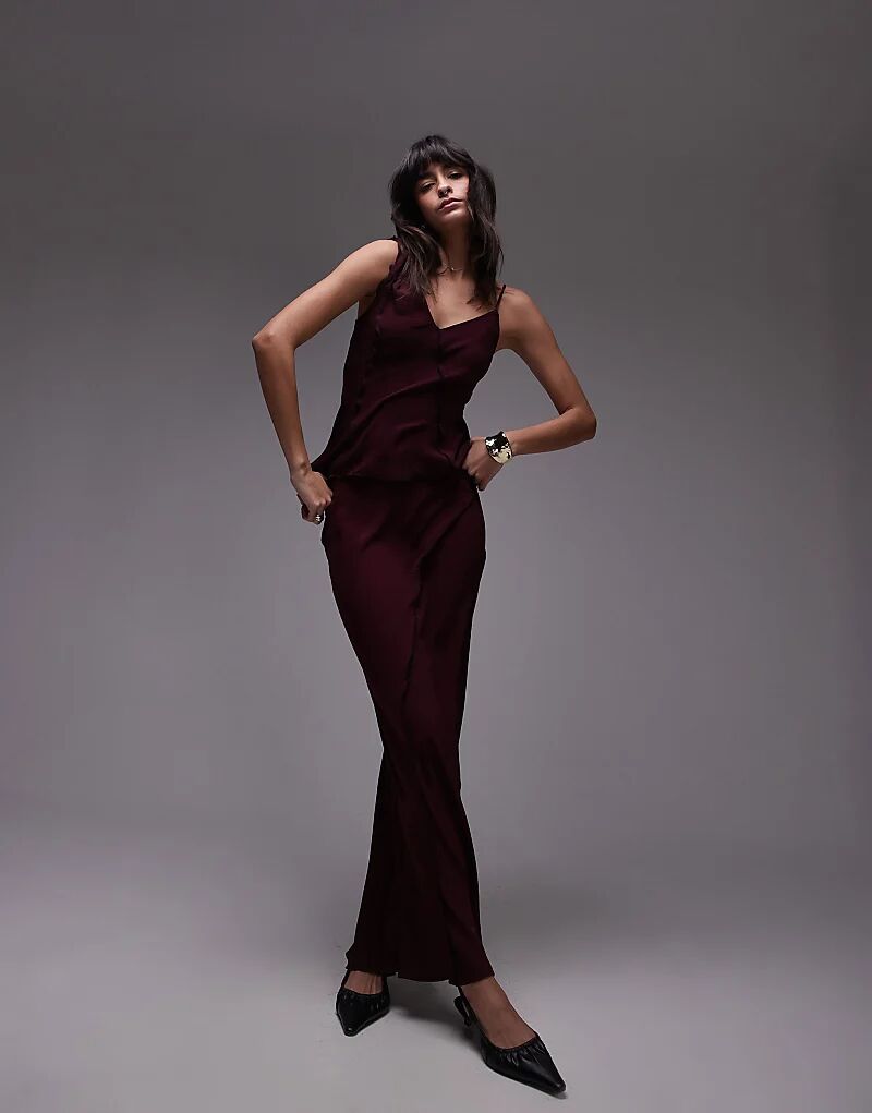 Юбка макси с необработанным краем от Topshop в бордовом цвете
Юбка макси с необработанным краем от Topshop в бордовом цвете