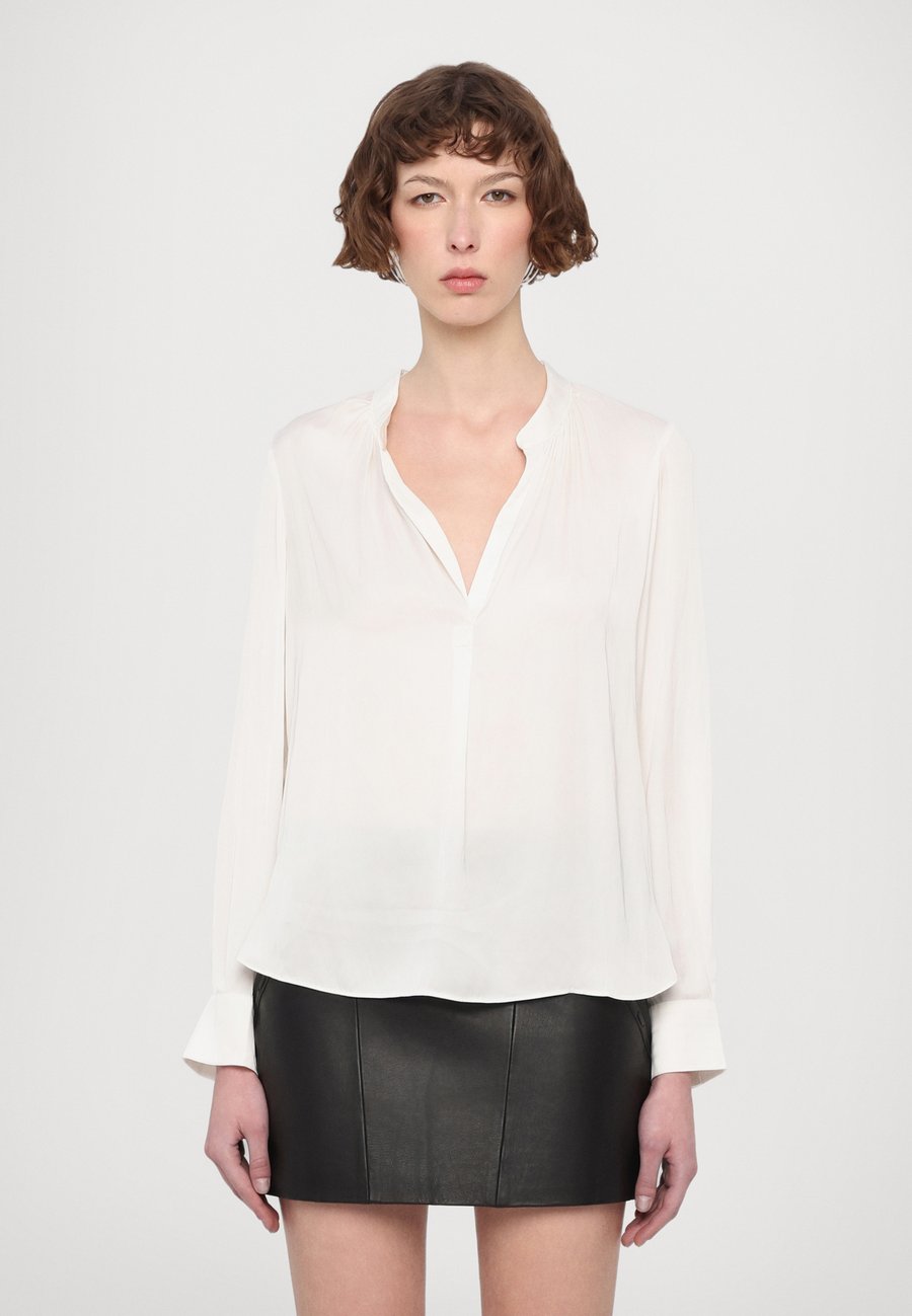 Блуза Zadig & Voltaire TINK PERM, Ecru/Off-White
Блуза Zadig & Voltaire TINK PERM, Ecru/Off-White