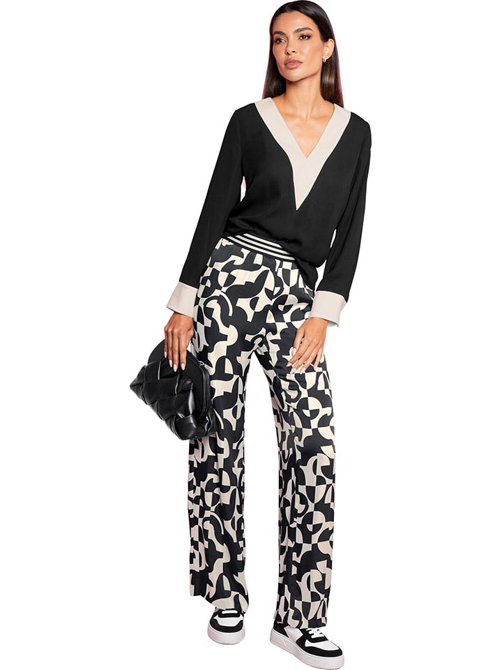 Heine Черная блузка
Heine Черная блузка