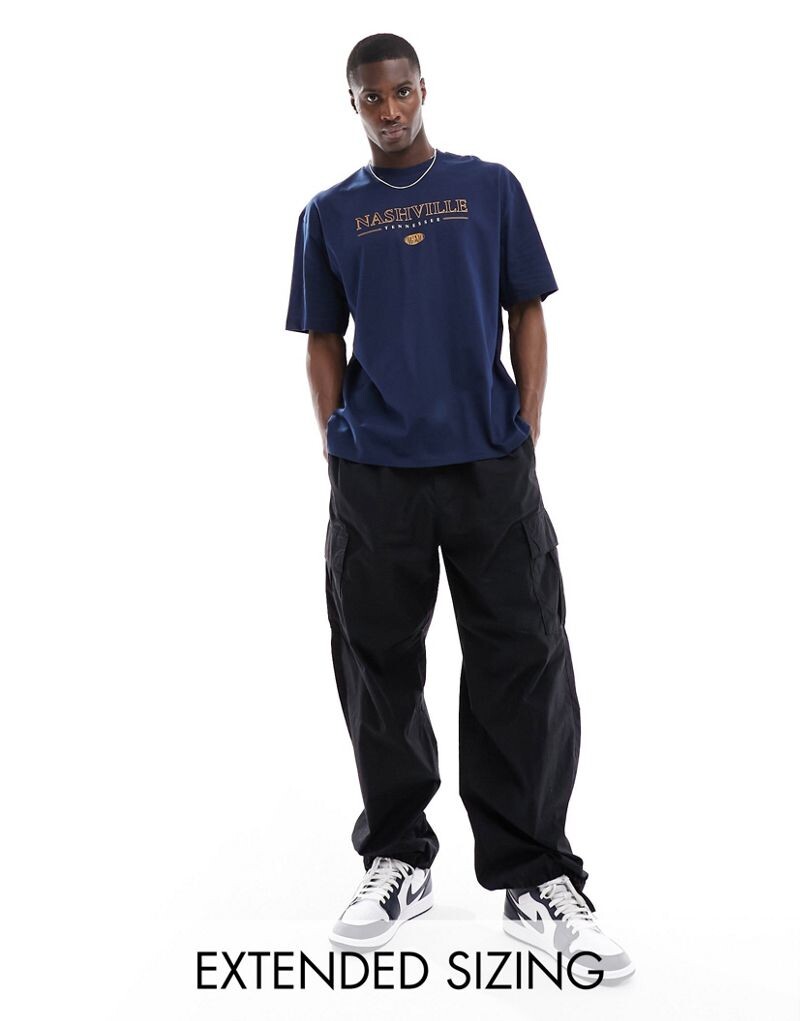 Темно-синяя футболка оверсайз с городским принтом на груди ASOS DESIGN
Темно-синяя футболка оверсайз с городским принтом на груди ASOS DESIGN