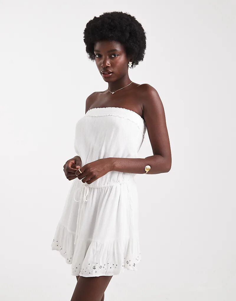 Мини-платье без бретелек с оборками Hollister белого цвета
Мини-платье без бретелек с оборками Hollister белого цвета